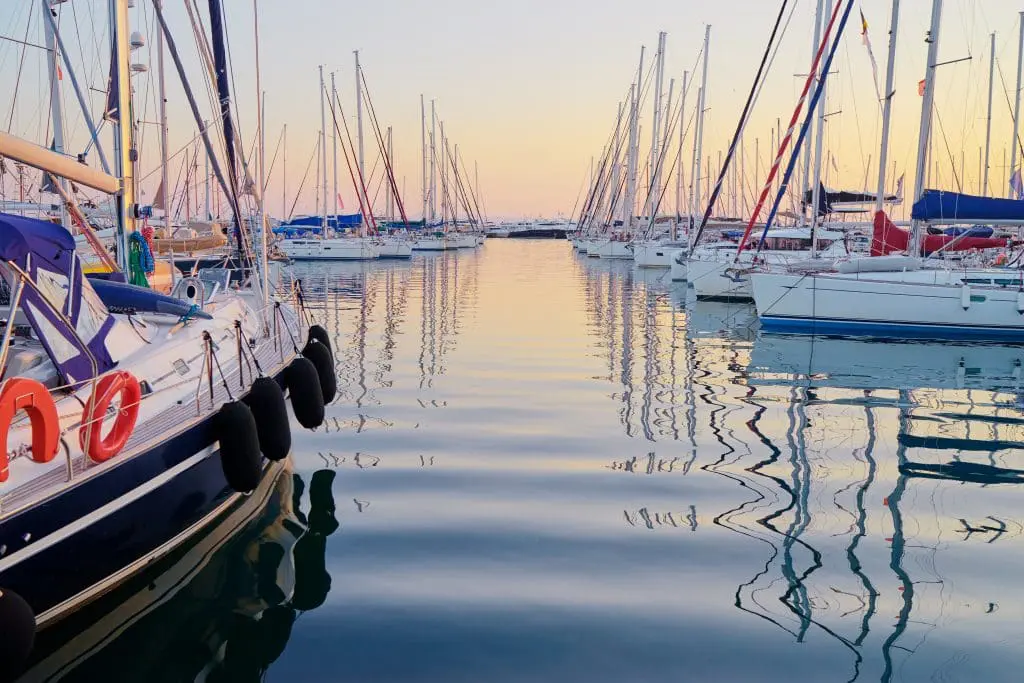 Marina harbour with beautiful white yachts in Athens, Greece.